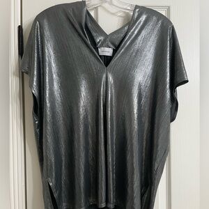Silver shimmery blouse for Holiday fun. Barely worn.  Light and comfy.